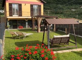 Casa Ginni con Piscina e giardino, hotell med pool i Caravonica