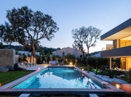 Villa Renajolo 16 pers piscine chauffée 2 min plage en voiture, hotel a Sainte-Lucie de Porto-Vecchio