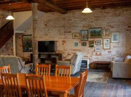 1885 Warehouse Apartment, alojamiento con cocina en Tumbarumba