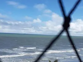 Apto pé na areia com vista para o mar no Litoral Sul