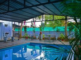 The club house- swimming pool that's better than the beach, B&B in Pondicherry