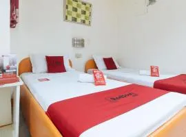 RedDoorz @ Golden Travellers Inn Antique