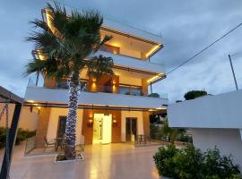 Finikas Suites & Apartments Airport By Airstay, hotel v destinaci Artemida