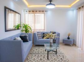 Luxury, cozy apartment Alma Rosa /15 min airport，Los Tres Ojos de Agua的公寓