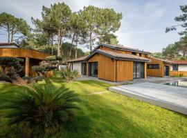 Villa 5 chambres à Biscarrosse avec piscine chauffée, wifi, proche océan - FR-1-521-18, hotel in Biscarrosse-Plage
