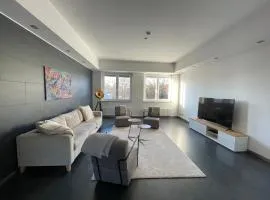 TruRetreats Design Loft für 8 Personen I Riesige Küche I eCharger I 65z SmartTV I 150qm