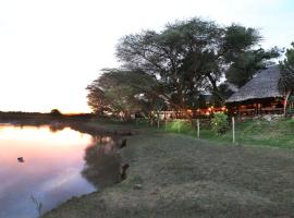 Mara River Lodge, chalé em Aitong