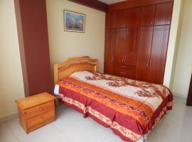 Comodo y centrico, habitación en casa particular en Ambato