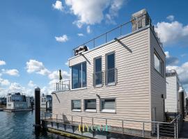 Schwimmendes Haus Hygge Olpenitz, barco en Olpenitz