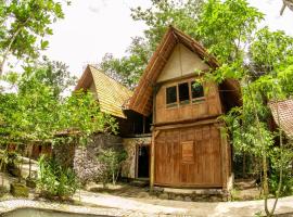 Villa Kampung Ayem Riverside, cabaña o casa de campo en Sleman