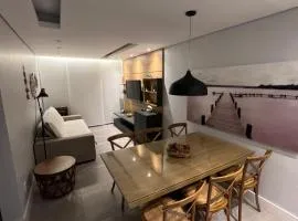 Apartamento Impecável Completo próximo à praia com Barco Opcional