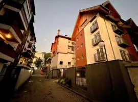 Apartamentos Onze1 no CENTRO by Achei Gramado