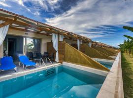 Kozanos Suites with Private Pool, hotel em Amoudi