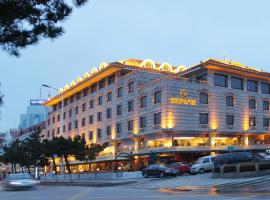 Qingdao Oceanwide Elite Hotel, hotel cerca de Luxun Park, Qingdao