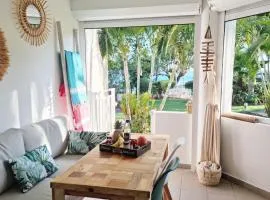 "Aimé Gwada", appartement à 40m de la plage, Rez-de-jardin tropical