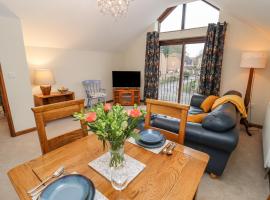 The Coach House, holiday home in Cheltenham