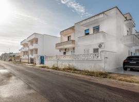 Trilocale con vista mare e spiaggia, апартаменты/квартира в городе Торре-Моцца