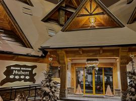 DWOREK MYŚLIWSKI HUBERT-Tutaj czeka na ciebie oszczędność & komfort & najlepsza lokalizacja, Jesteśmy przy samych Termach Bania i Stoku Narciarskiego Kotelnica, Na miejscu wypożyczalnia nart, rowerów w atrakcyjnej cenie dla gości oraz darmowy parking, hotel in Białka Tatrzanska