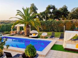 Casa Rural El Canto Del Agua, caba&ntilde;a o casa de campo en Malpartida de Plasencia