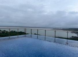 Studio Apt with Rooftop Panoramic views @ Dabolim, apartment in Vasco Da Gama