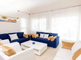 Pristine 4BR Beachfront Getaway with Pool & Rooftop