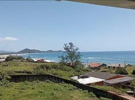 Casa Oryba pertinho do mar da Ribanceira em Imbituba