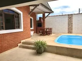 Casa Enseada/ótima localização