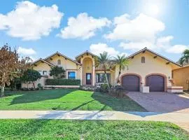 Serene waterfront home with pool, spa, and water view