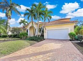 Large waterfront home with all-day sun on pool
