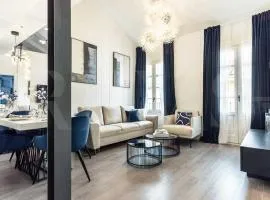 Contemporary luxe duplex in the heart of Malaga by REMS