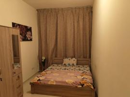 Private Room In shared apartment in heart of Ajman, hotel near City University College of Ajman CUCA, Ajman 