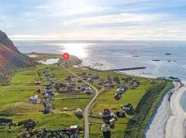 House by the ocean with midnight sun view