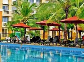 2BR Casa Mia Sanremo Oasis Cebu, хотел в Талисей