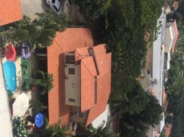 Pousada Casa de Vó, posada u hostería en Eusébio