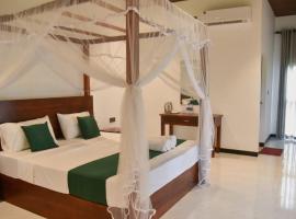 Sigiriya Paradise Inn, отель типа «постель и завтрак» в Сигирии