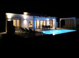 Sunset Sea View Villa 10, дом для отпуска в городе Афионас