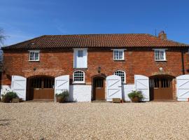 Manor House Stables, Martin - lovely warm cosy accommodation near Woodhall Spa, holiday home in Martin