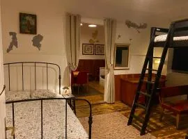 Basic small flat in an old railway station ground floor