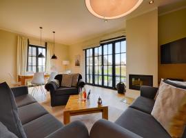 Reetland am Meer - Luxus Reetdachvilla mit 3 Schlafzimmern, Sauna und Kamin F08, hotell i Dranske