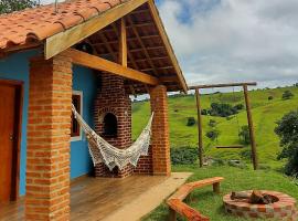 Chalés Encantos de Minas, hotel v destinaci Bueno Brandão