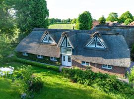 Ferienwohnung Reethuus 5, FeWo Vermittlung Nordsee، فندق في دانغاست