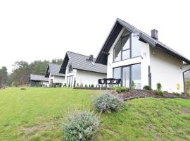 Modern holiday homes directly on the lake in Kiedrowice, holiday home in Kiedrowice