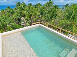 Casa Alkimia Town, hospedagem domiciliar em Isla Mujeres