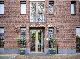 Luxury Suites Amsterdam, hotel cerca de Teatro Real Carré, Ámsterdam