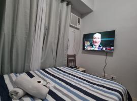 Macks Awesome Place 204 NetflixFastWifi, hotell i Manila