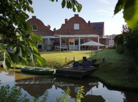 Grachtenkate, hotel em Greetsiel