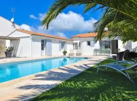 Superbe villa avec piscine chauffée à proximité de la plage