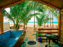 orange sky beach bungalow, strandhotell i Agonda