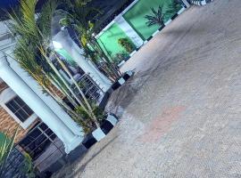 Naboya House Serviced Apartment, hotel di Benin City