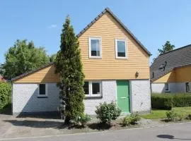 Nice holiday home with sauna on a holiday park, 200m from the beach